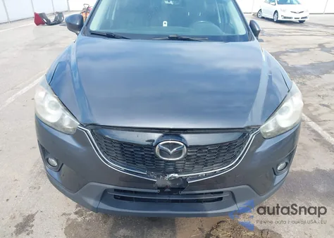 2014 Mazda Cx-5 Touring z USA, uszkodzony, nr VIN JM3KE2CY3E0358604